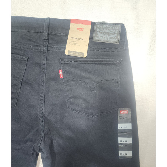 Levi's 711 skinny mid rise jeans 29x32 woman's - Picture 6 of 9